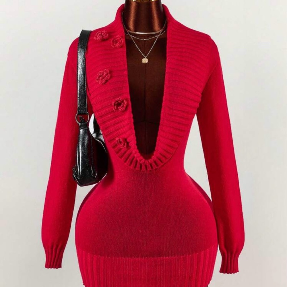 Red knit dress with deep V-neck, fitted mini length. Size M